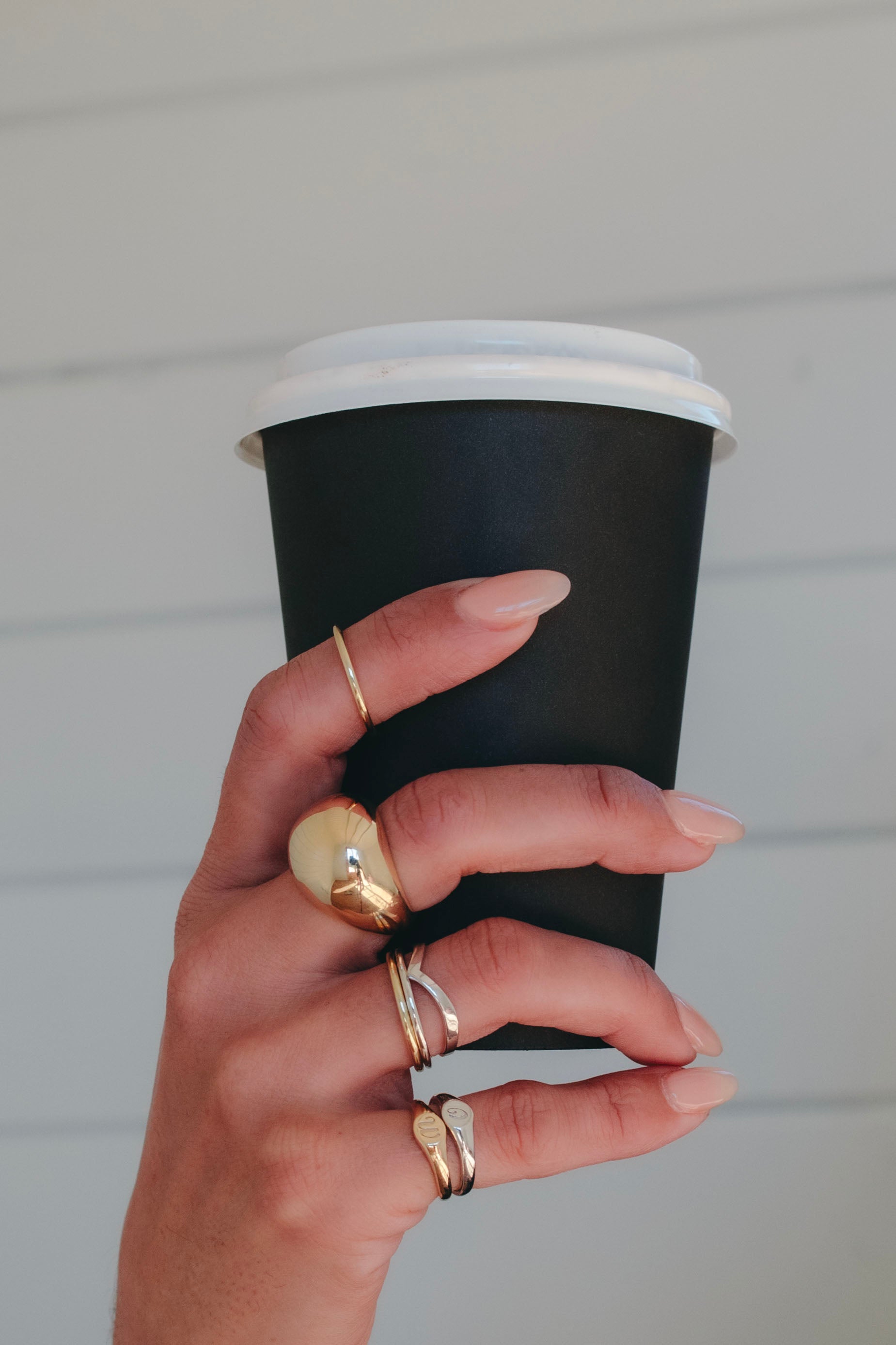 Close-up of minimal Australian gold jewellery for the modern woman