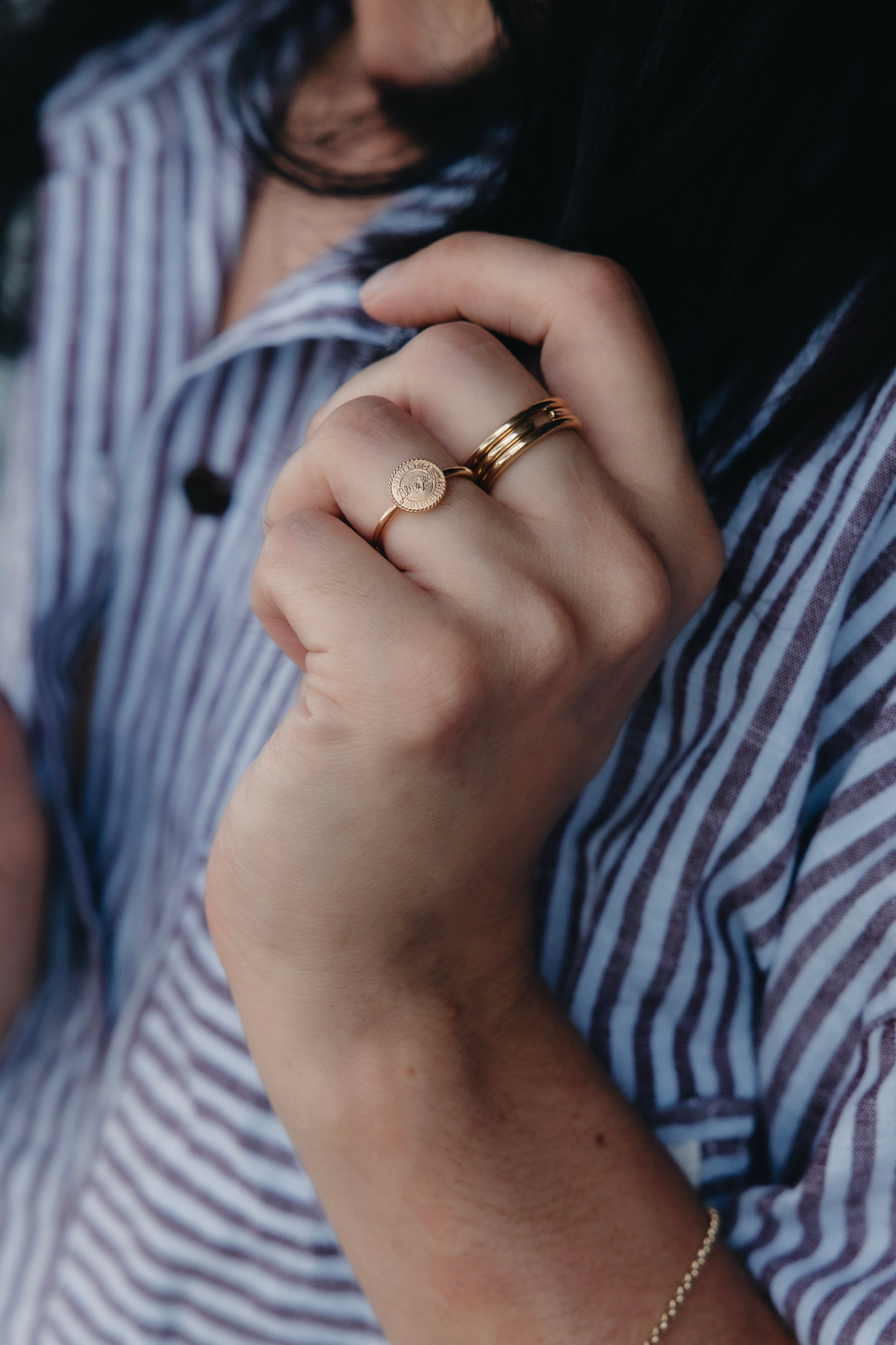 Founder of ByCC Fine Jewellery wearing both 1.8mm plain bands and open ended band, reflecting understated luxury and longevity.