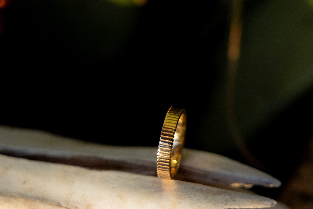 Clean, modern jewellery feed featuring Australian solid gold pieces styled in warm brown tones with a minimalist, editorial look