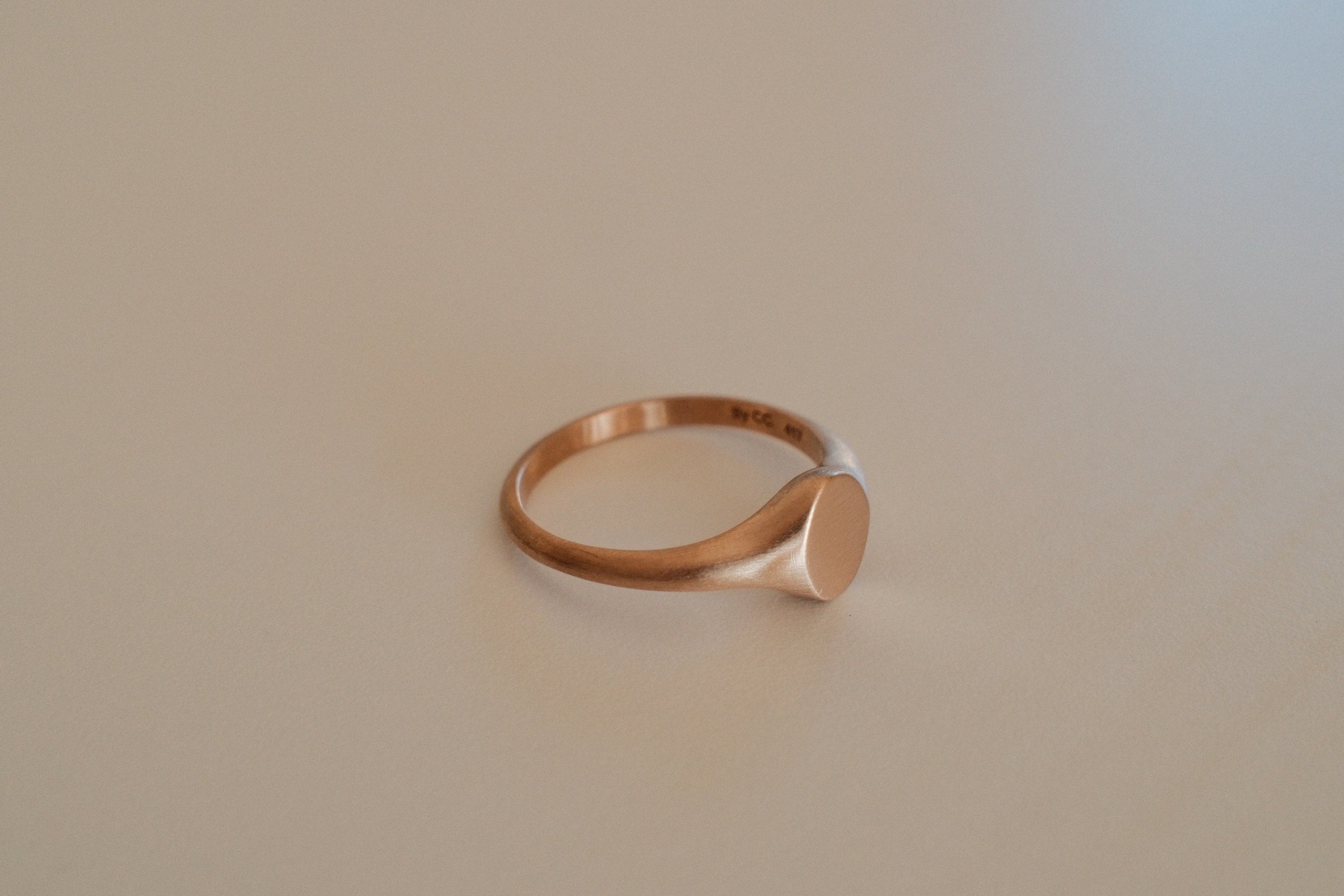 Passing notes Pinky Signet Ring