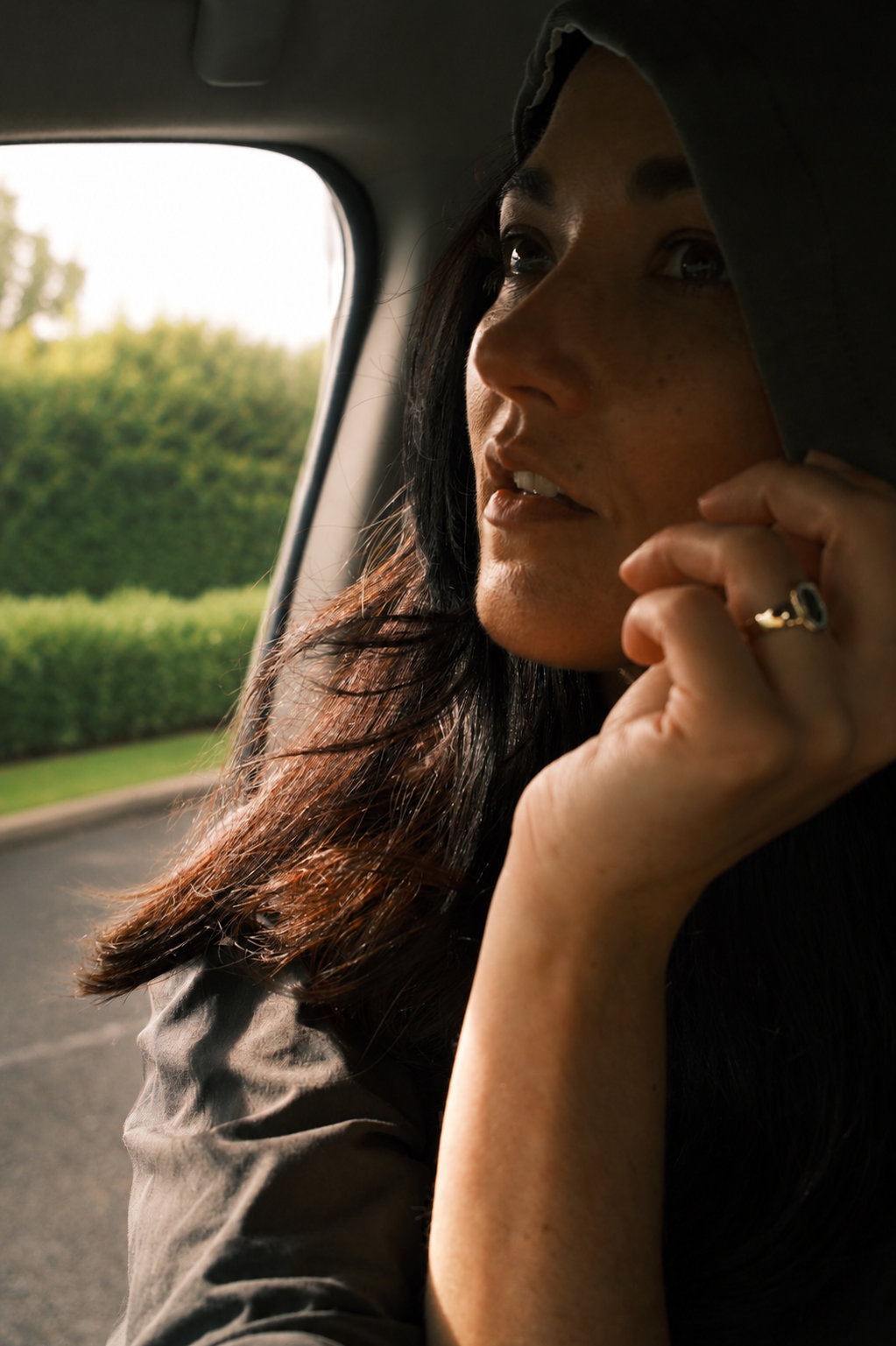 BYCC Fine Jewellery owner sitting in a car with a blurred background