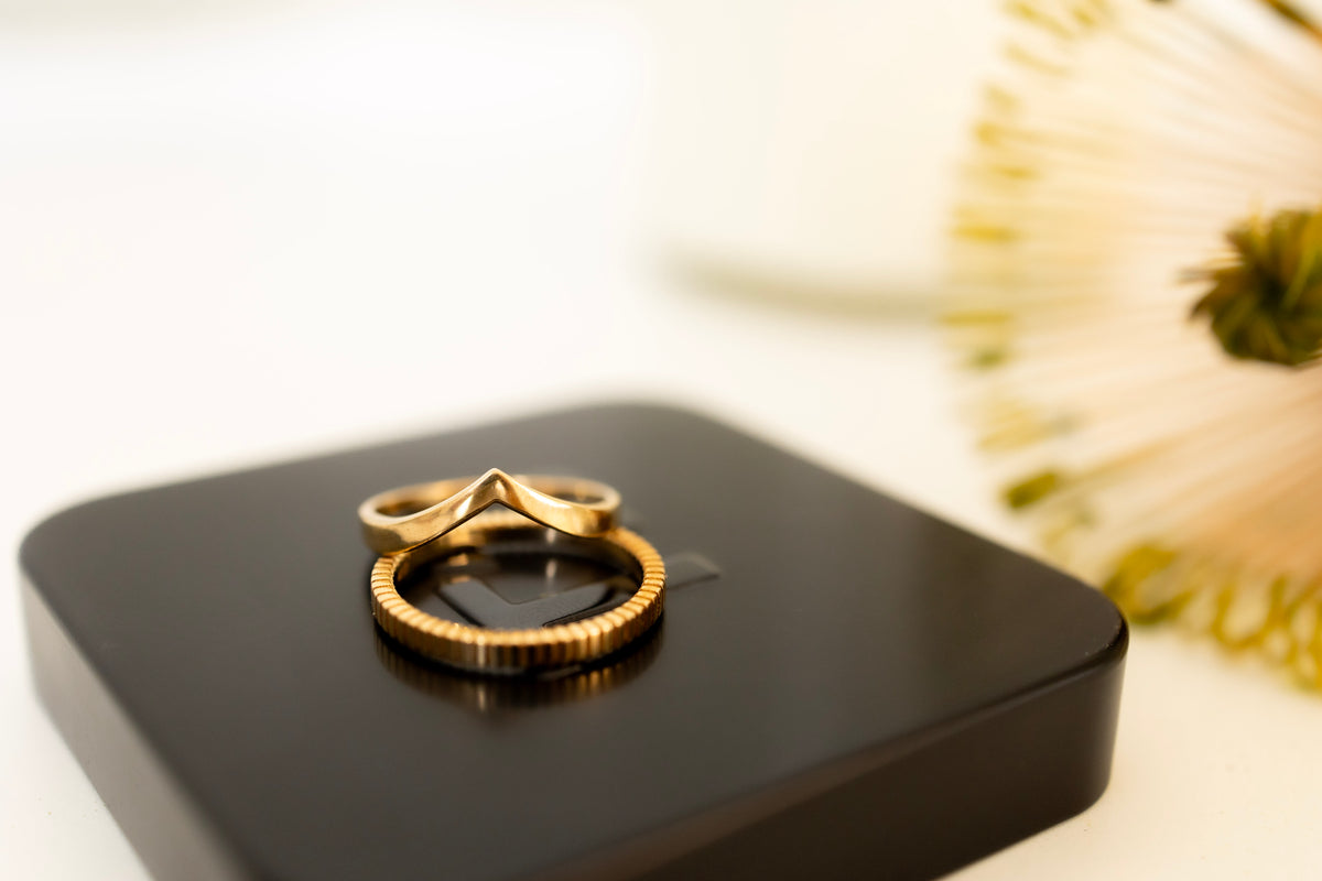 Close-up of minimalist Australian jewellery in solid gold
