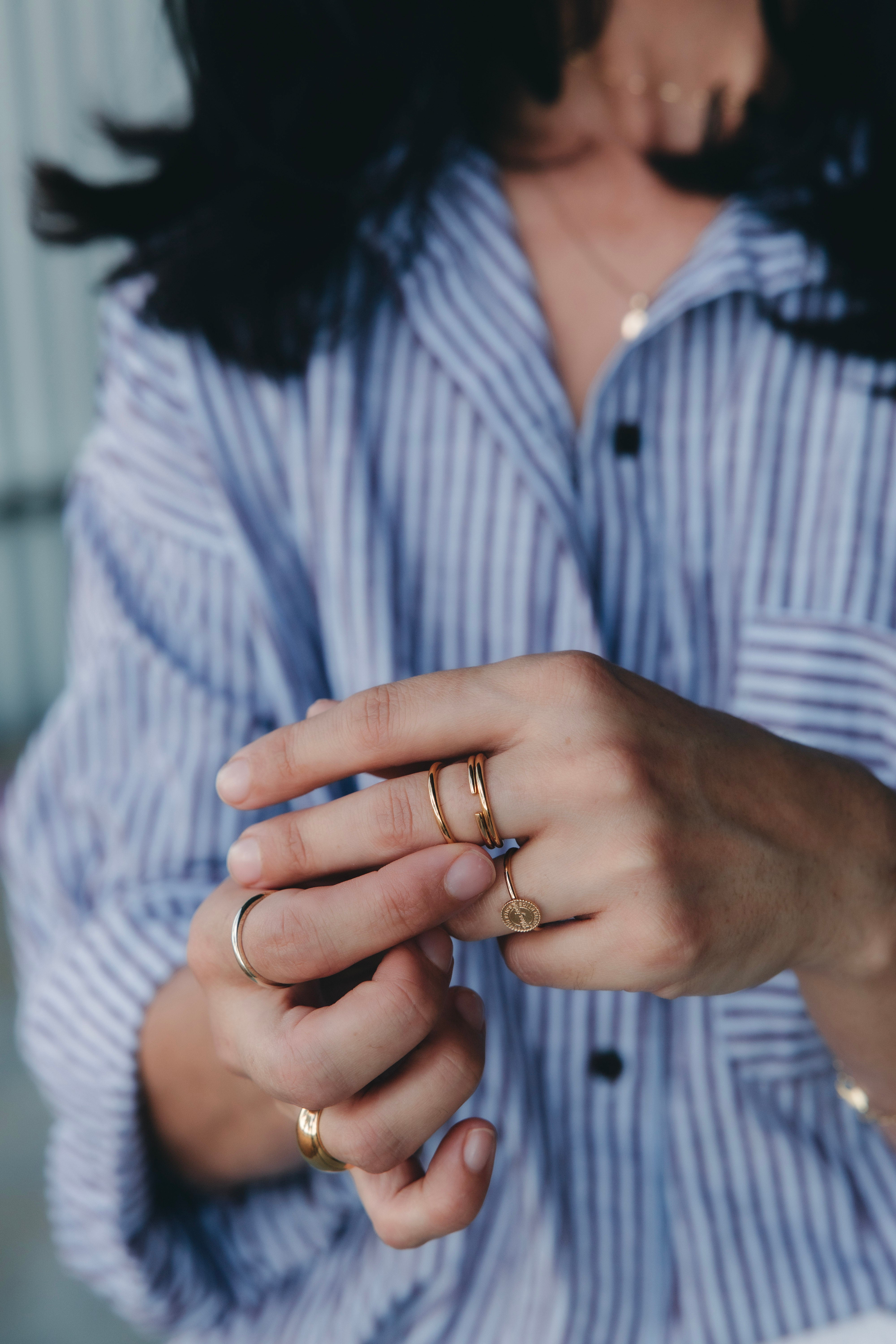 Founder wearing ByCC Fine Jewellery gold rings and chain as an everyday staple. Ceres life matching set, styled simply to highlight the craftsmanship.
